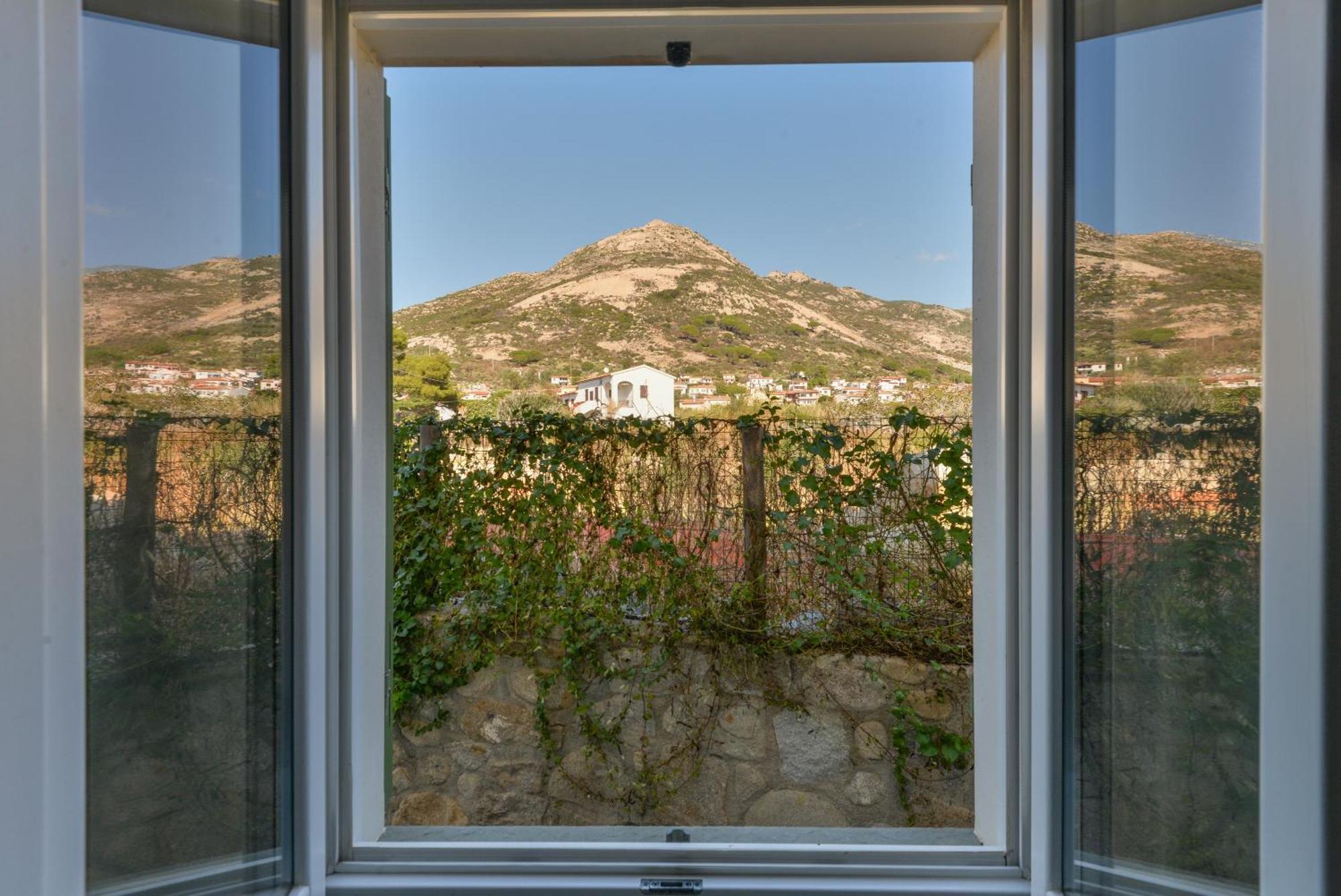 Il Quartiere Apt Pianosa Pomonte Exteriör bild